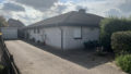 Einfahrt mit Garage